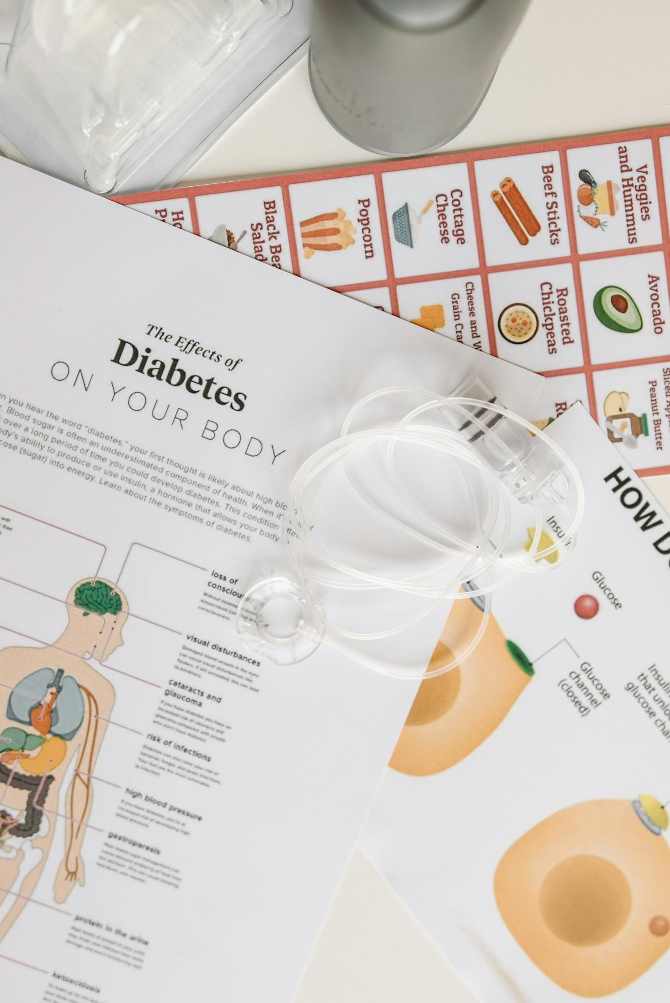 Close-up of diabetes health and diet pamphlets with illustrations and informative guides.
